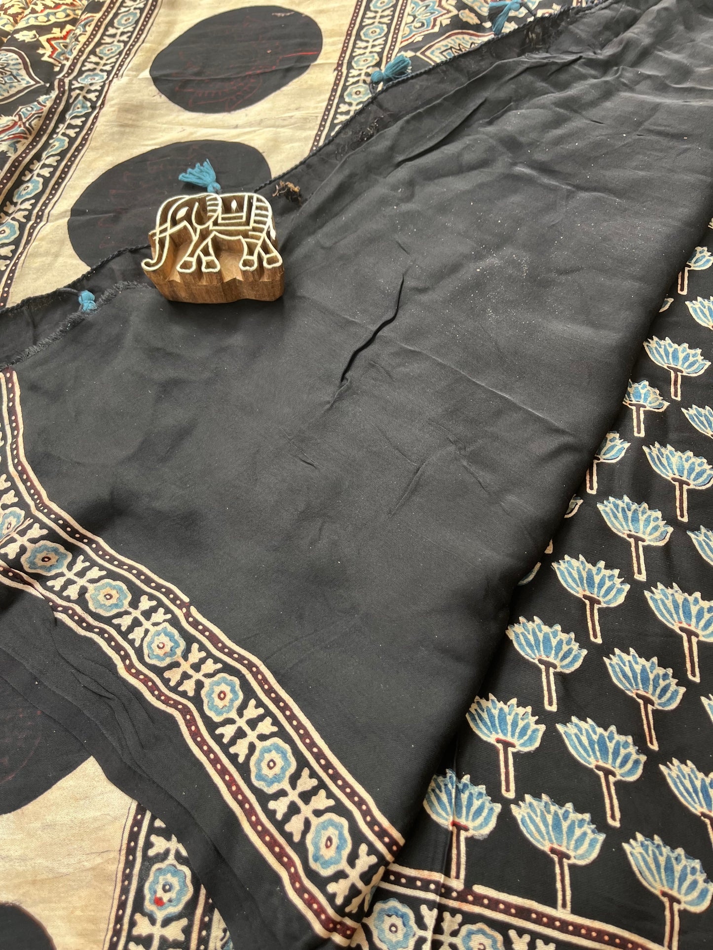 Ajrakh Modal Silk Saree - Black Lotus Motifs (with tasssels)